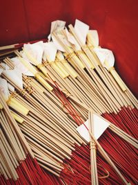 High angle view of incenses and candles