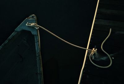 Low angle view of rope against blue sky