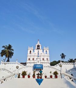 Low angle view of building against blue sky