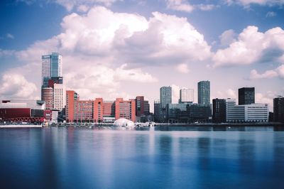 Buildings in city against sky