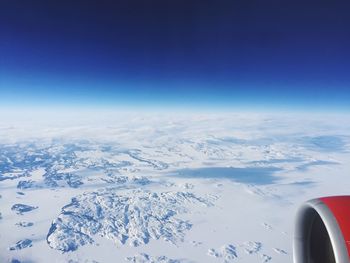 Aerial view of landscape against cloudy sky