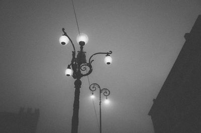 Low angle view of illuminated street light