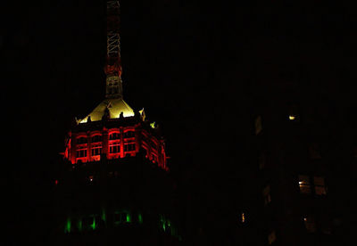 Low angle view of illuminated building at night