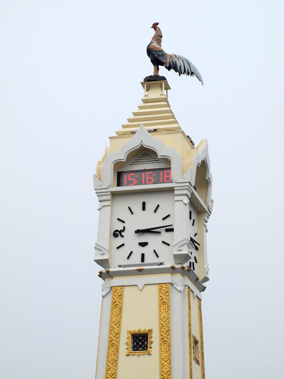 LOW ANGLE VIEW OF CLOCK TOWER AGAINST SKY