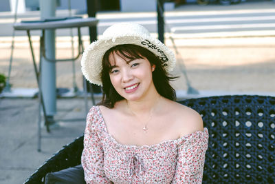 Portrait of smiling young woman