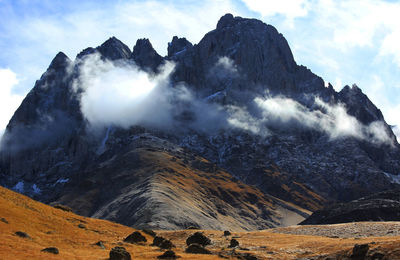 Scenic view of snowcapped mountains against sky