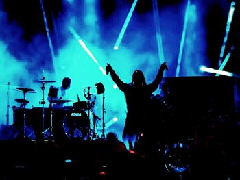 People enjoying music concert