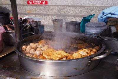 Close-up of meat in cooking pan