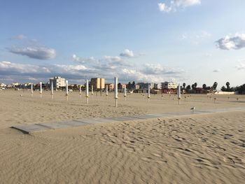 Panoramic view of sandy beach against sky