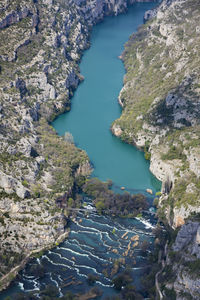 High angle view of river amidst rocks