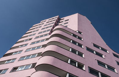 Low angle view of modern building against clear sky