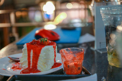 Close-up of cake served on table