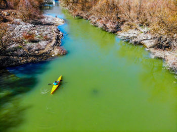 High angle view of people in river