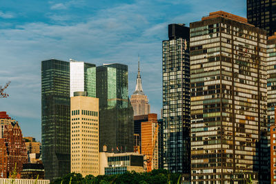 Low angle view of buildings against sky in city