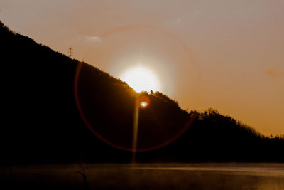 Scenic view of mountains at sunset