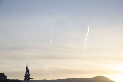 Low angle view of vapor trails in sky