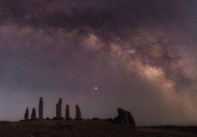 Scenic view of star field against sky at night