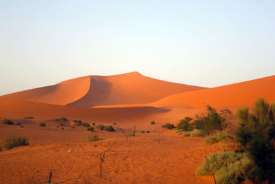 Scenic view of desert against clear sky