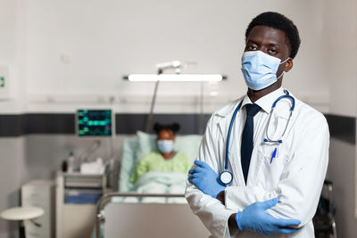 Portrait of doctor wearing mask at hospital