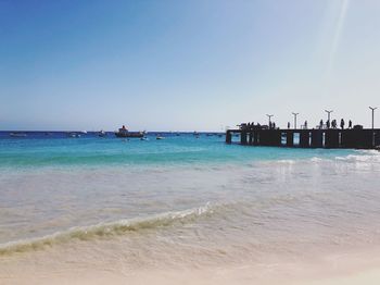 Scenic view of sea against clear sky