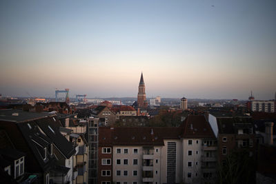 Cityscape against clear sky