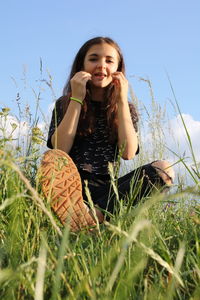 Portrait of a smiling girl on field