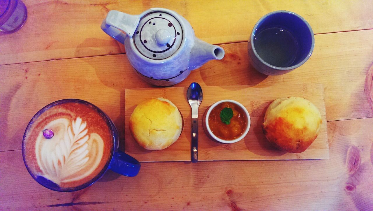 food and drink, freshness, food, table, still life, indoors, drink, high angle view, plate, healthy eating, refreshment, ready-to-eat, directly above, bowl, spoon, breakfast, sweet food, fruit, wood - material, coffee cup