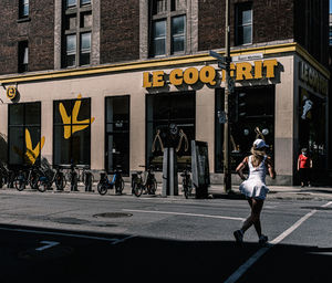 People walking on street in city