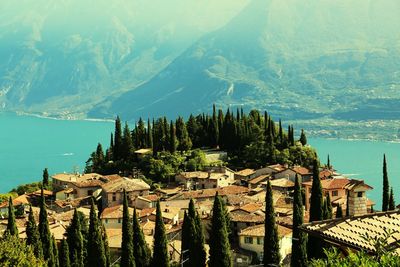 Panoramic view of houses and mountains against sky