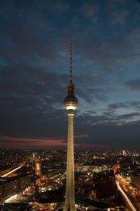 Fernsehturm in illuminated city at night