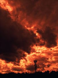 Low angle view of dramatic sky during sunset