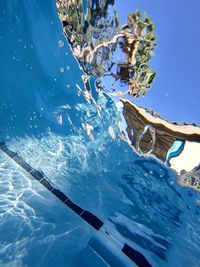 Low angle view of swimming pool against sky