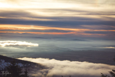 Scenic view of dramatic sky during sunset