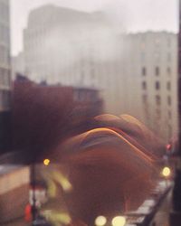 Defocused image of illuminated city at night