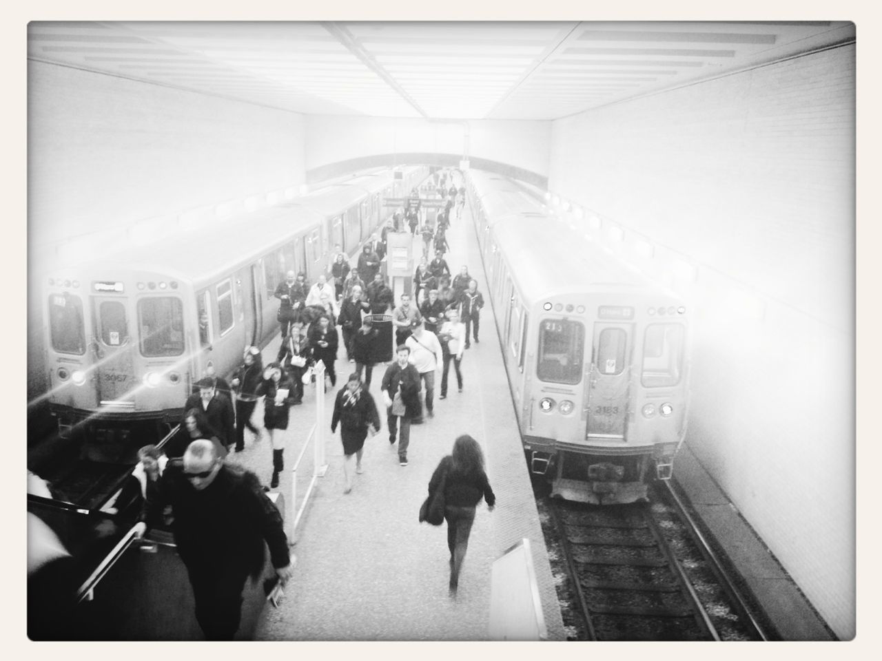 large group of people, men, person, lifestyles, transfer print, architecture, indoors, built structure, walking, city life, leisure activity, city, auto post production filter, travel, building exterior, mixed age range, crowd, transportation, group of people