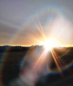 Scenic view of dramatic sky during sunset