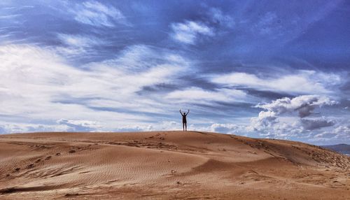 Scenic view of desert against sky