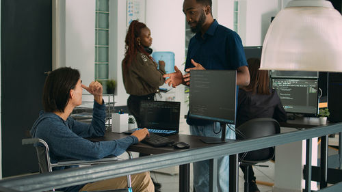 Business colleagues working at office