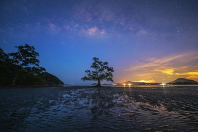 Scenic view of sea against sky at night