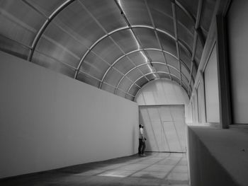 Man walking in corridor