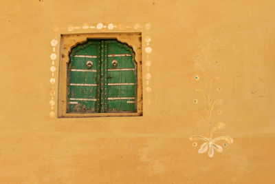 Full frame shot of window of old building