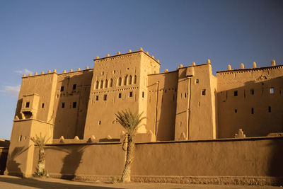 Low angle view of building against blue sky