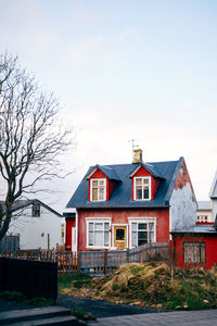 Houses and buildings against sky