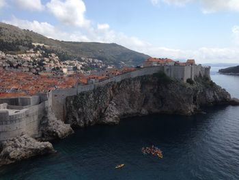 High angle view of boats in sea and city walls dubrovnik