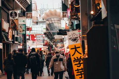 People on street in city
