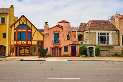 Buildings in city against sky