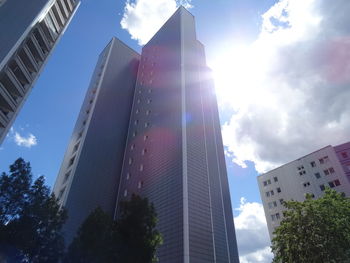 Low angle view of modern buildings against sky