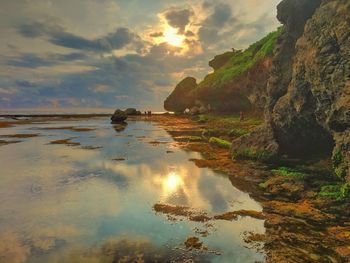 Scenic view of sea against sky during sunset