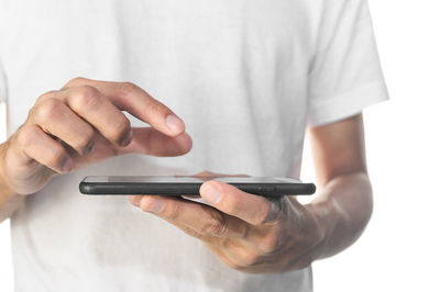 Close-up of man using mobile phone