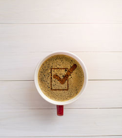 High angle view of coffee cup on table